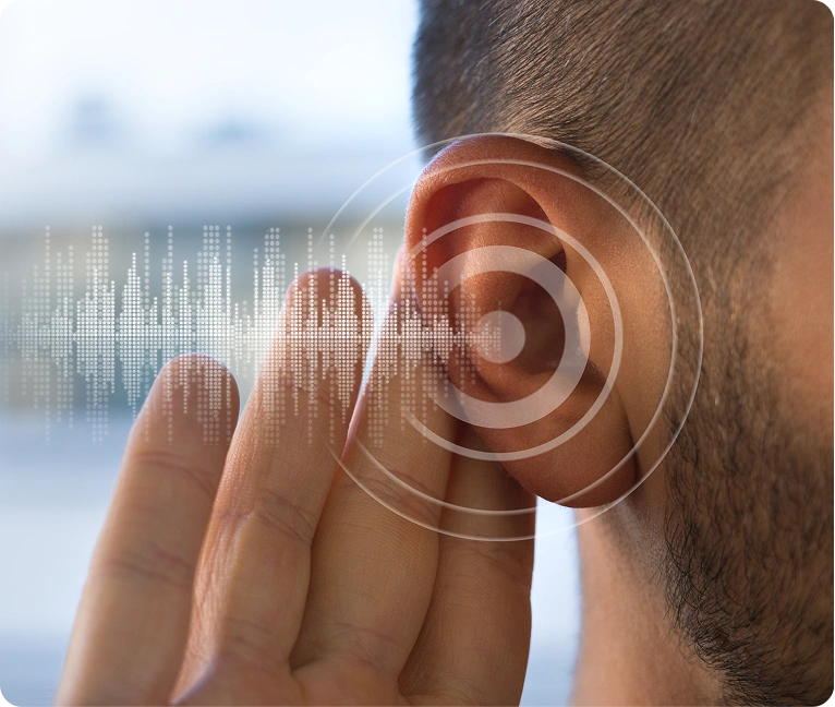 Man with his hand on his ear, touching a sound waveform, indicating that he is listening to a podcast