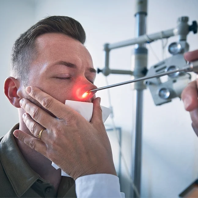 Nasal endoscopy with illuminated scope